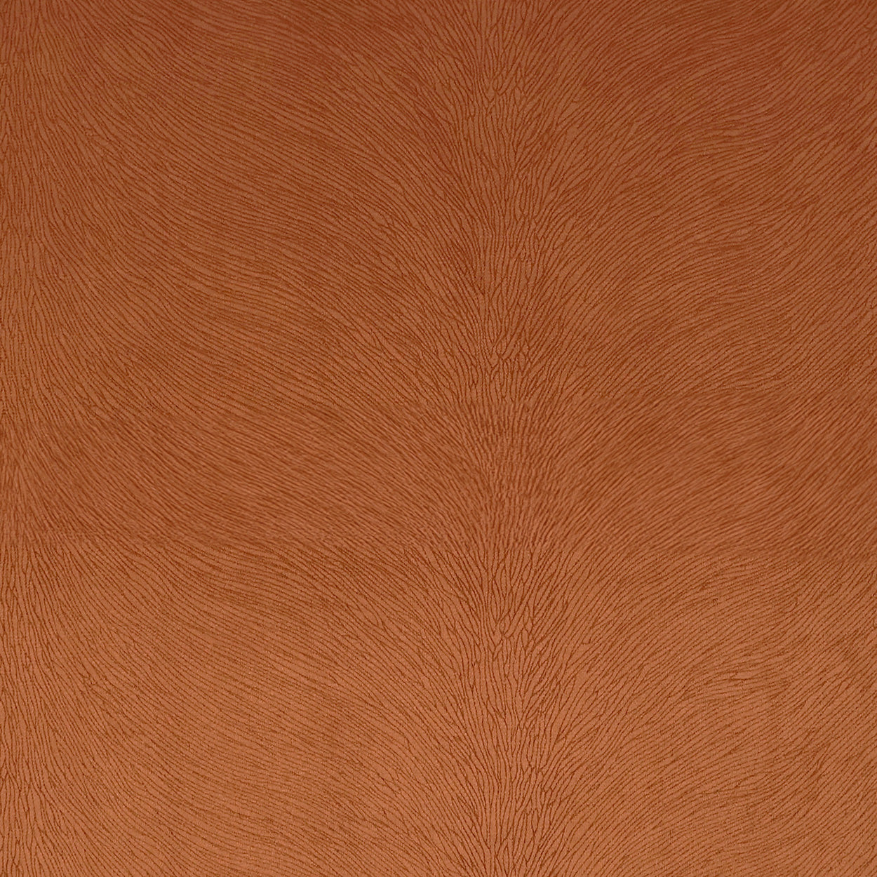 Orange-brown leather-like fabric with a fine grain texture, versatile for upholstery or fashion.