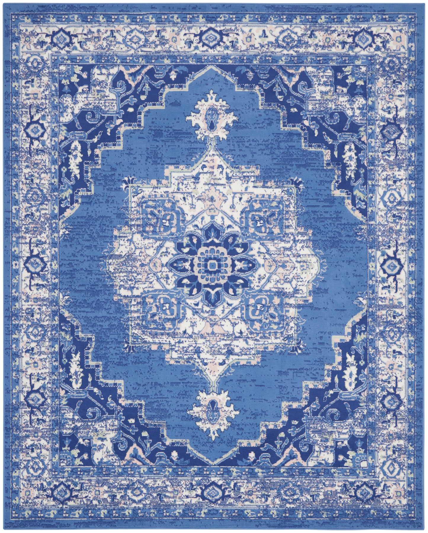 Blue distressed oriental rug with a white central medallion and ornate border; rectangular, traditional decor.