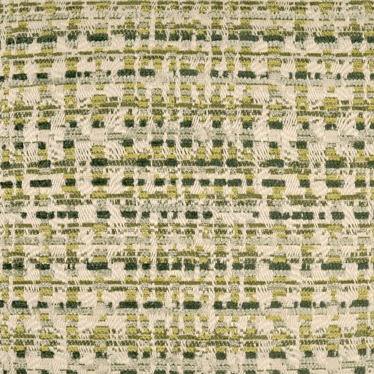 Close-up of woven fabric with cream base and olive-green and yellow speckled threads in a grid-like weave.