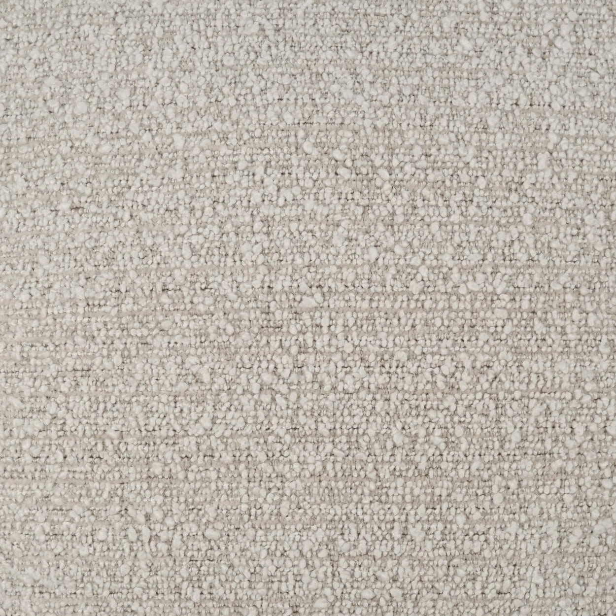 Beige boucle fabric close-up; soft, textured upholstery material with a speckled, looped surface.