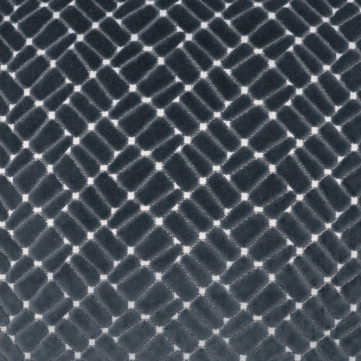 Dark navy fabric with a repeating diagonal lattice of rounded rectangle scales.
