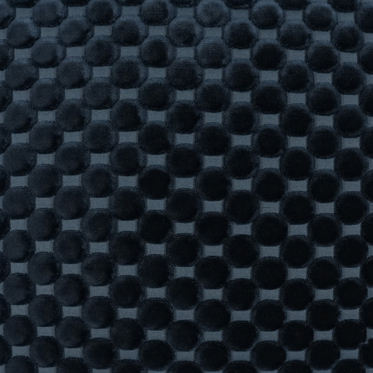 Charcoal fabric with uniform raised dot texture in a grid; soft, grip-friendly surface.