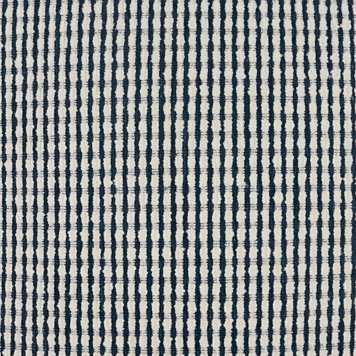 Pillow with cream woven fabric and navy vertical pinstripes, 24" x 24".