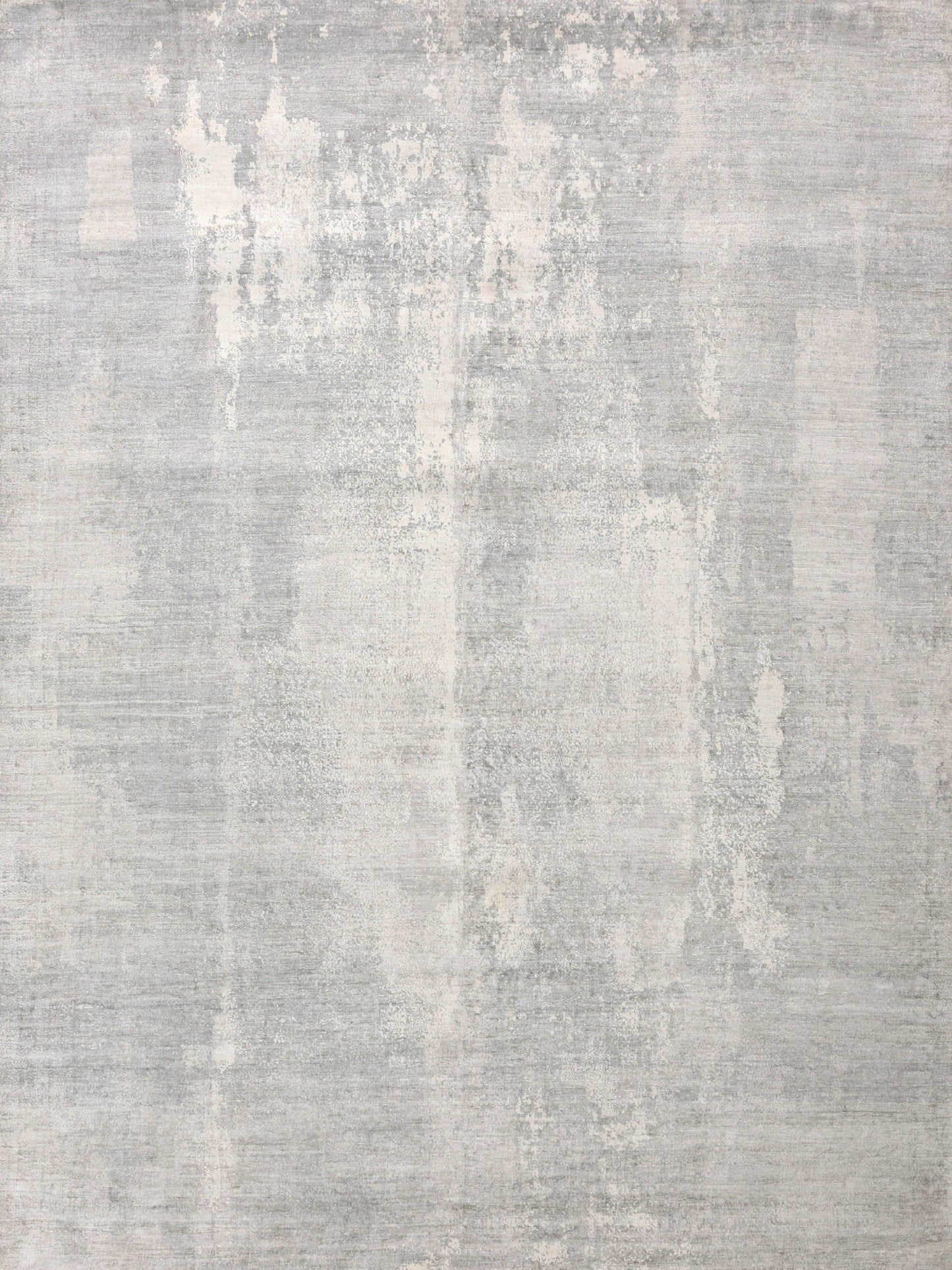Light gray and cream abstract rug with a textured surface, featuring a distressed pattern and modern style suitable for various decor.