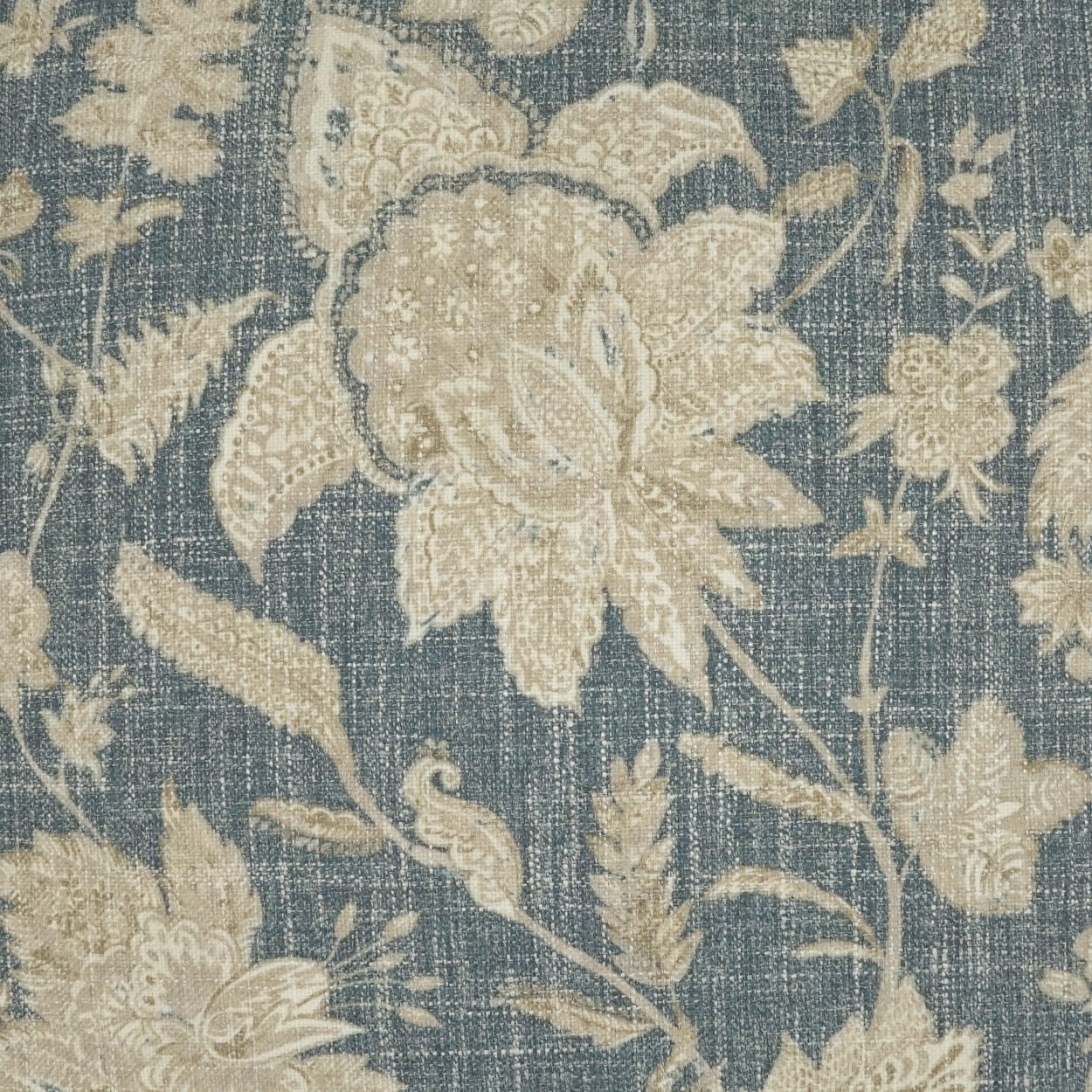 Blue fabric with cream damask floral pattern; linen texture, ideal for upholstery or curtains.