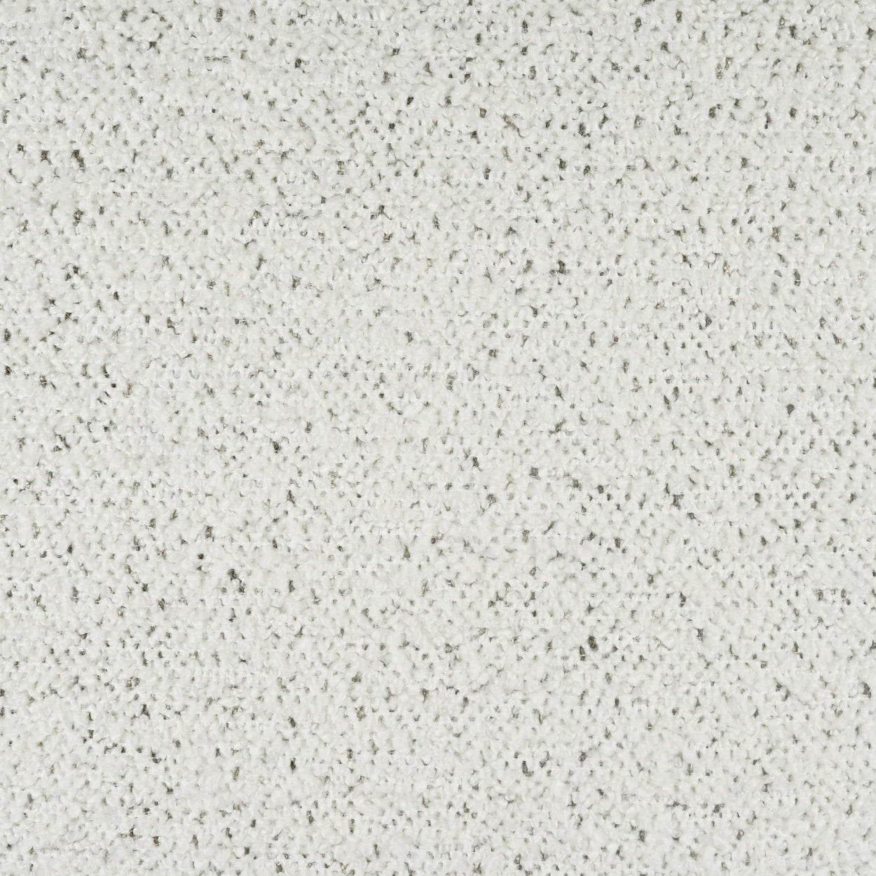 Cream-beige fabric close-up with speckled, nubby texture; soft, neutral upholstery material.