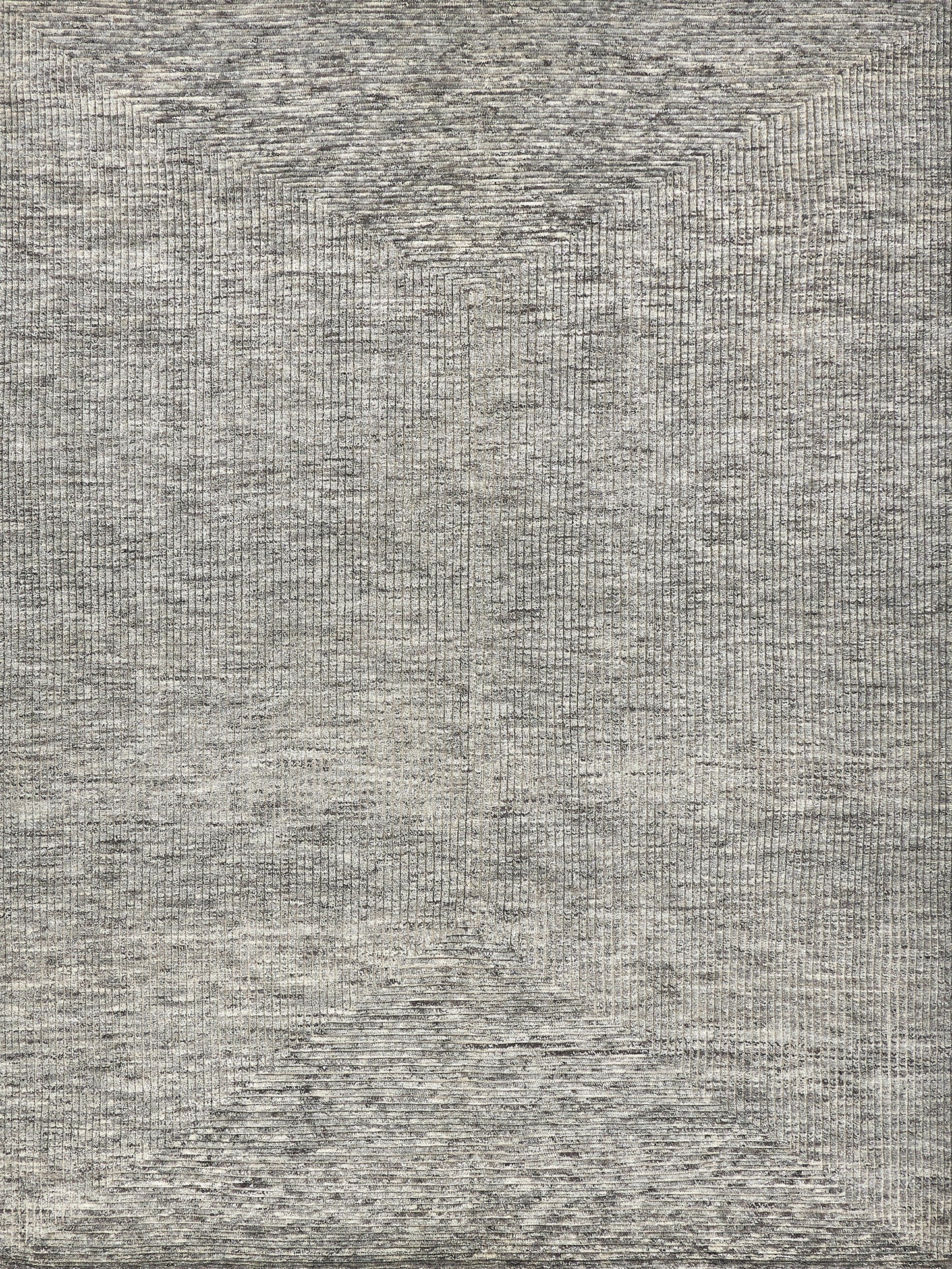 Textured gray area rug featuring a subtle geometric design with varying shades, ideal for modern interiors.
