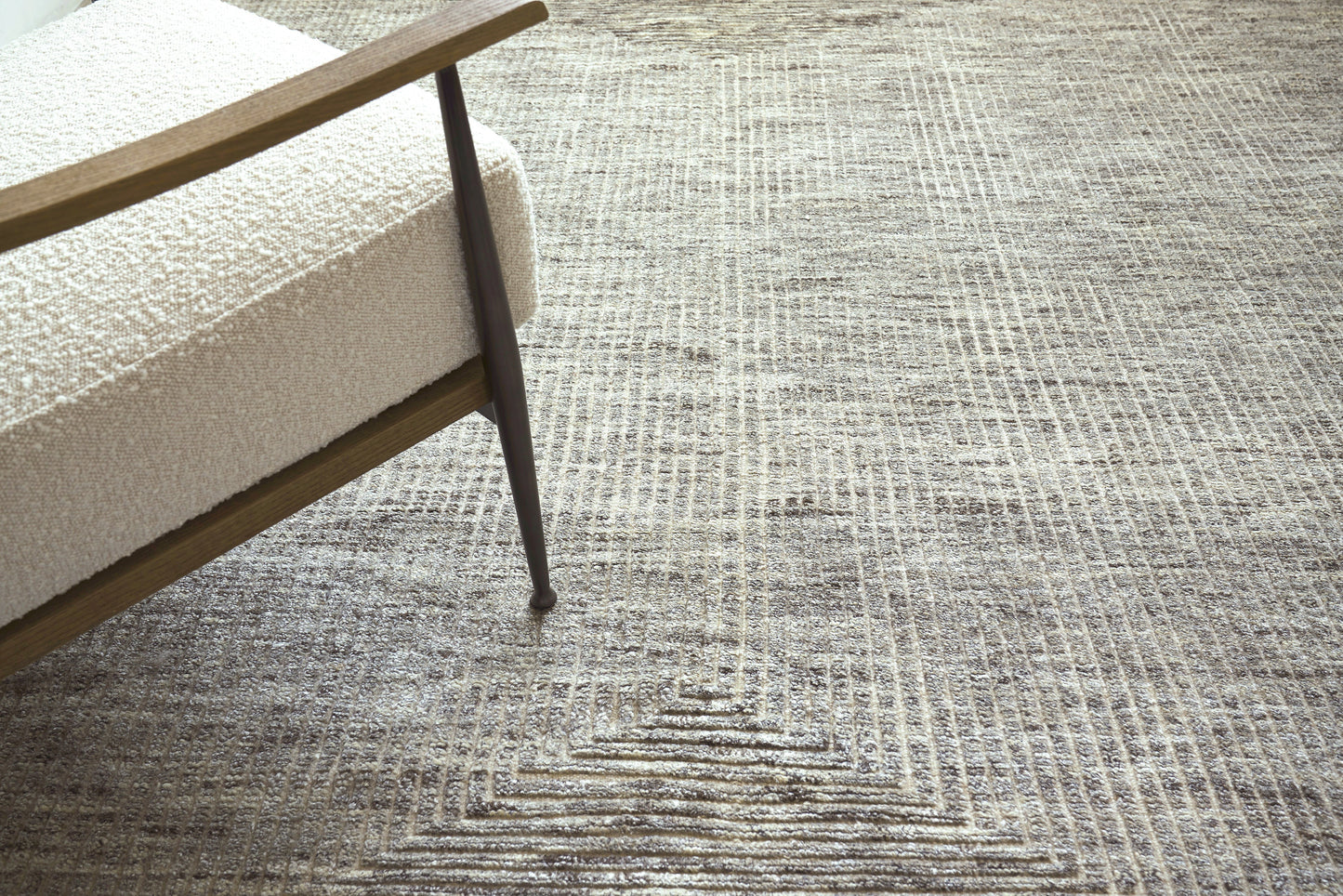 Beige textured rug in gray-beige tones.
