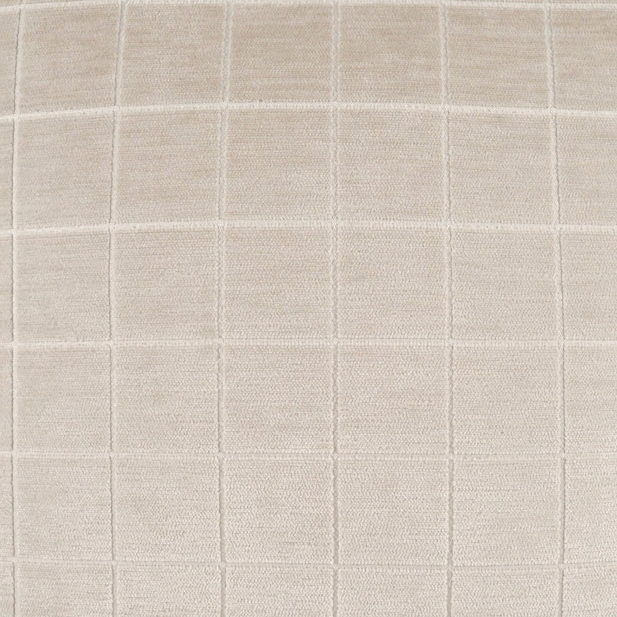 Beige textured fabric with a subtle square grid pattern; soft woven textile for home decor.