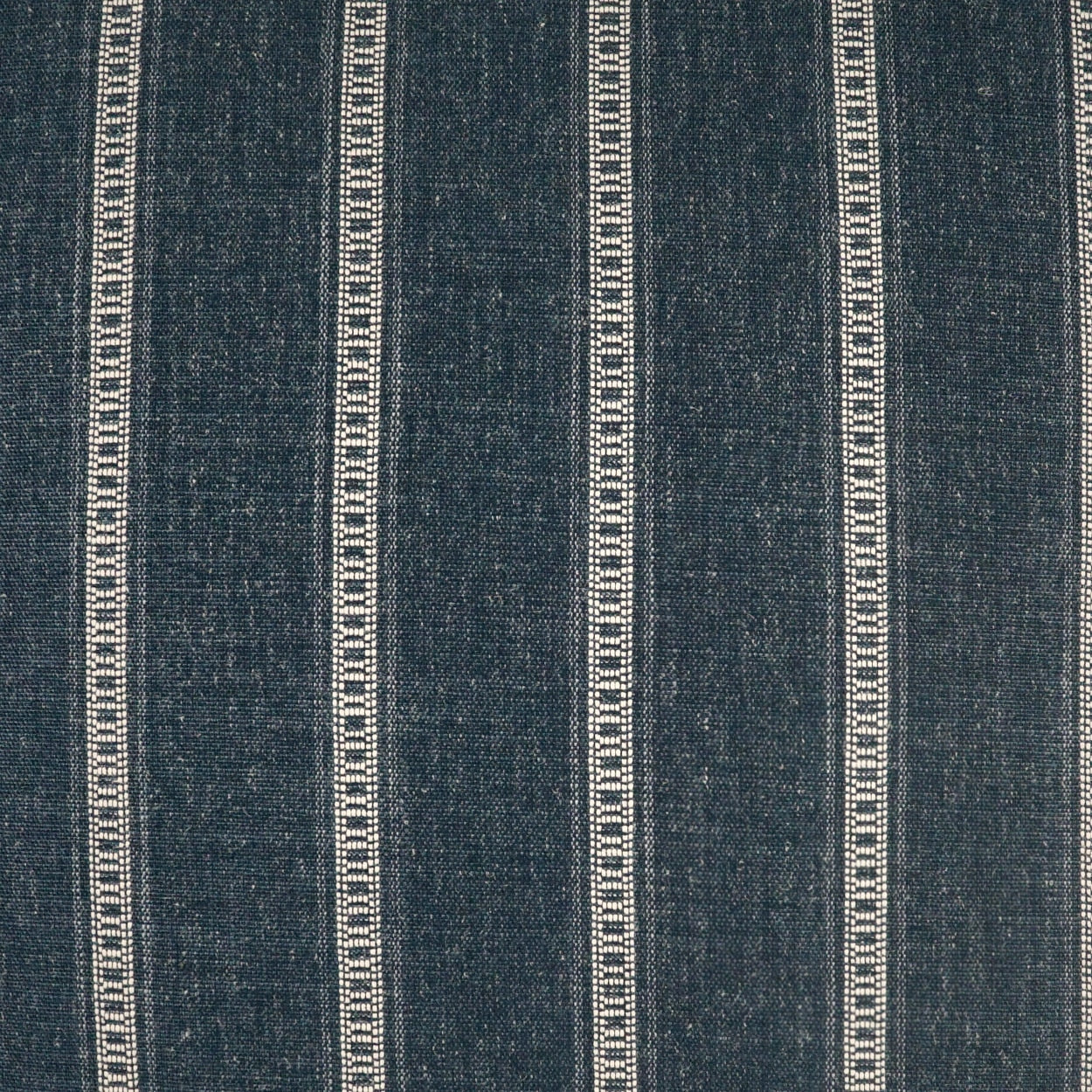 Dark indigo denim-style fabric with narrow vertical white stripes running in parallel.