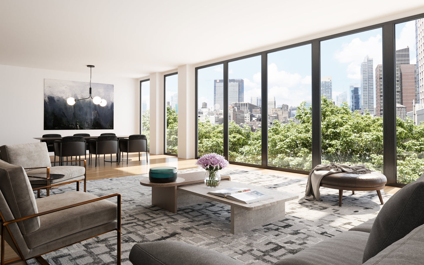 Modern open living room with floor-to-ceiling windows and a city skyline view, grey seating, a rug on the floor, and a low concrete coffee table.