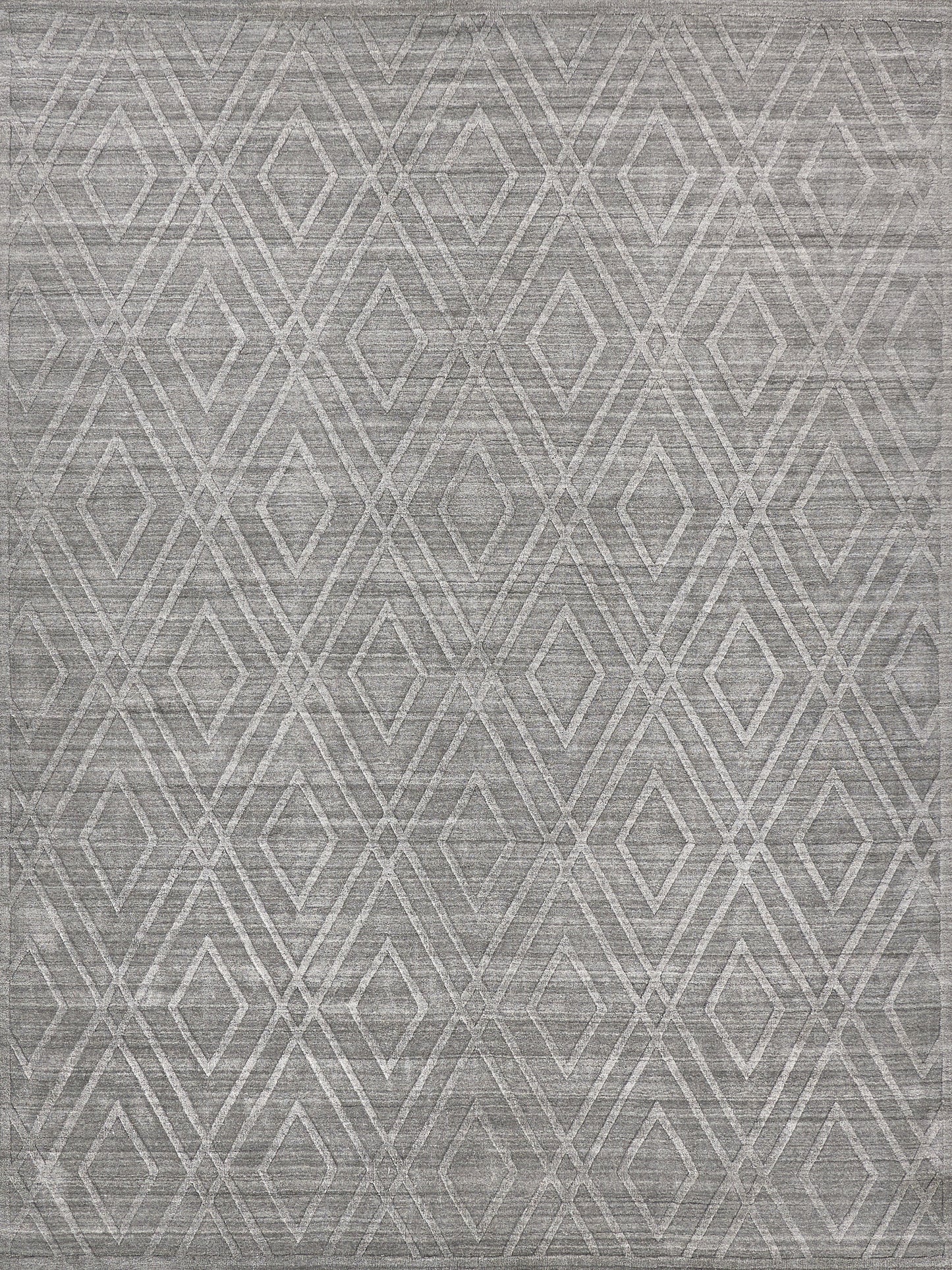 Gray area rug featuring a diamond pattern, with a textured surface and a contemporary style, suitable for modern decor.