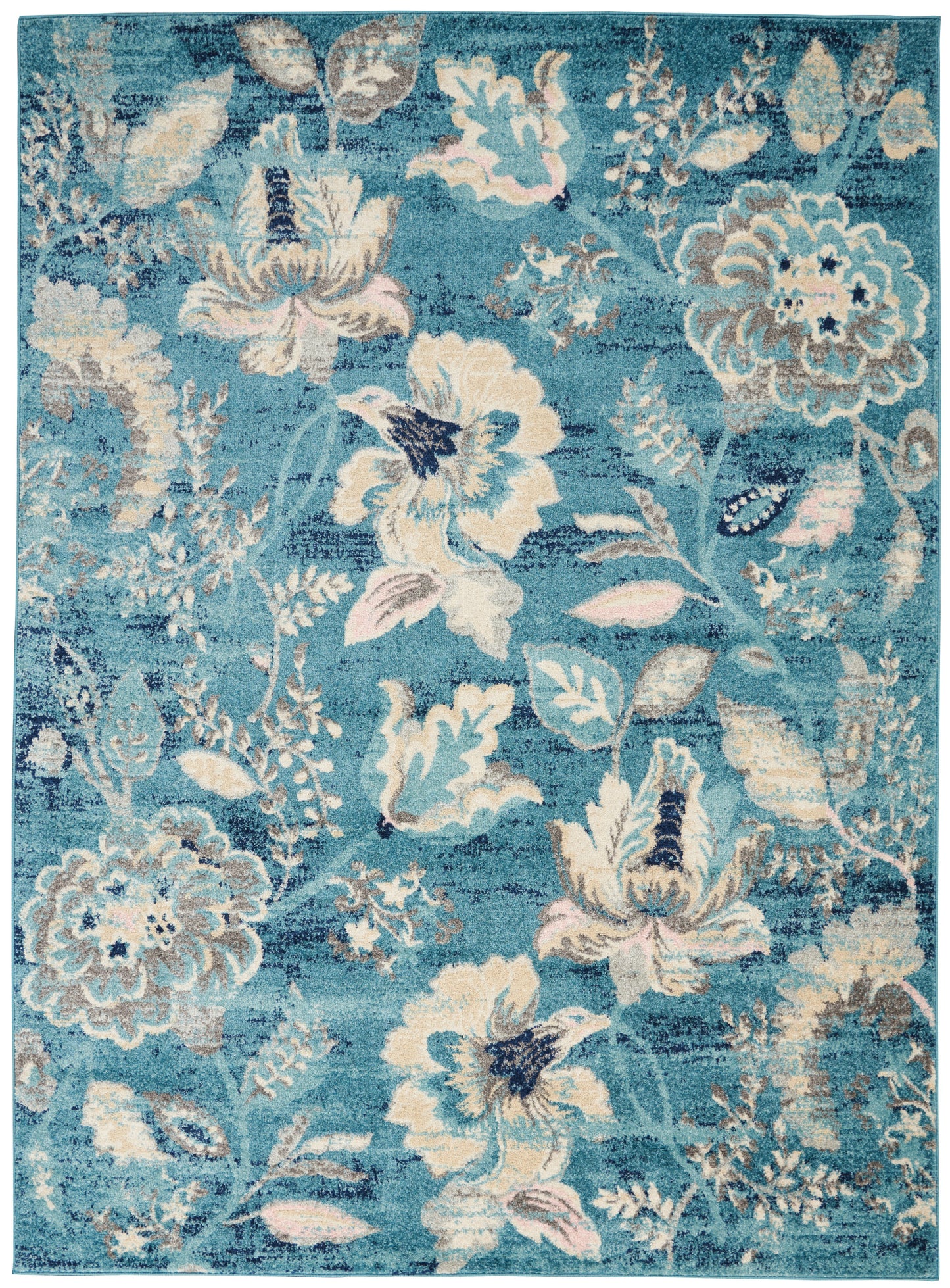 Teal blue floral area rug with cream/beige blossoms and leafy vines; rectangular, decorative living-room rug.