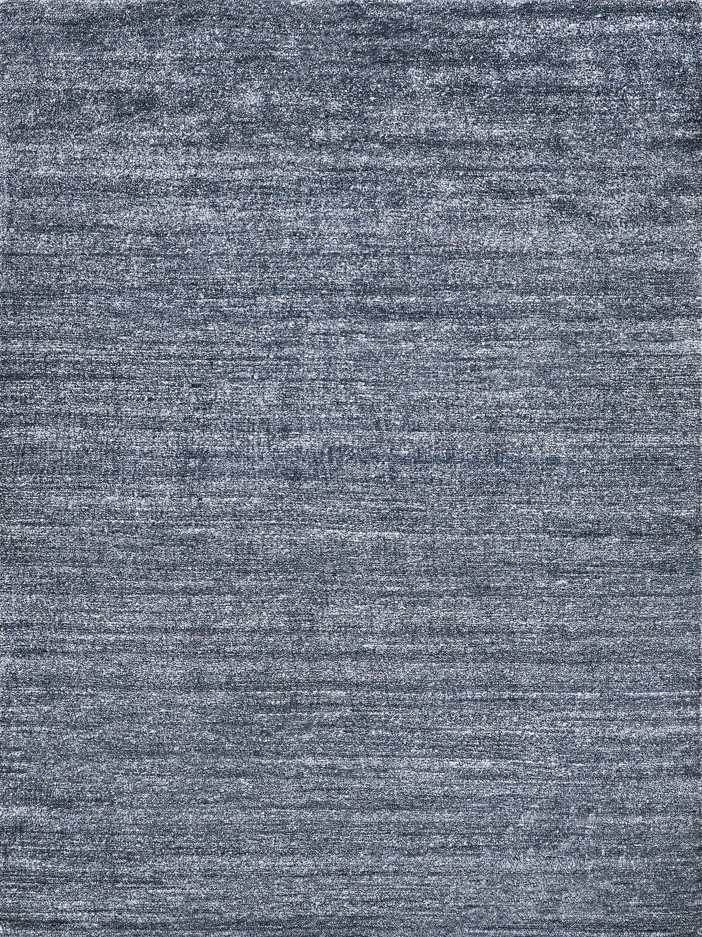Blue-gray plush indoor hand-knotted rug with a denim-like distressed texture; 2' x 3'.
