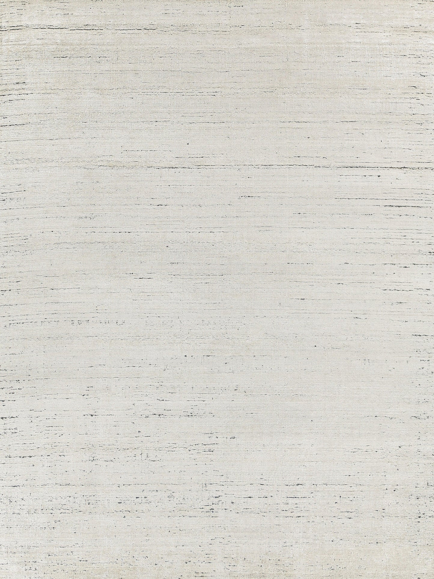 Light beige indoor hand-loomed rug with a distressed, textured weave and subtle horizontal lines; size 8' x 10'.