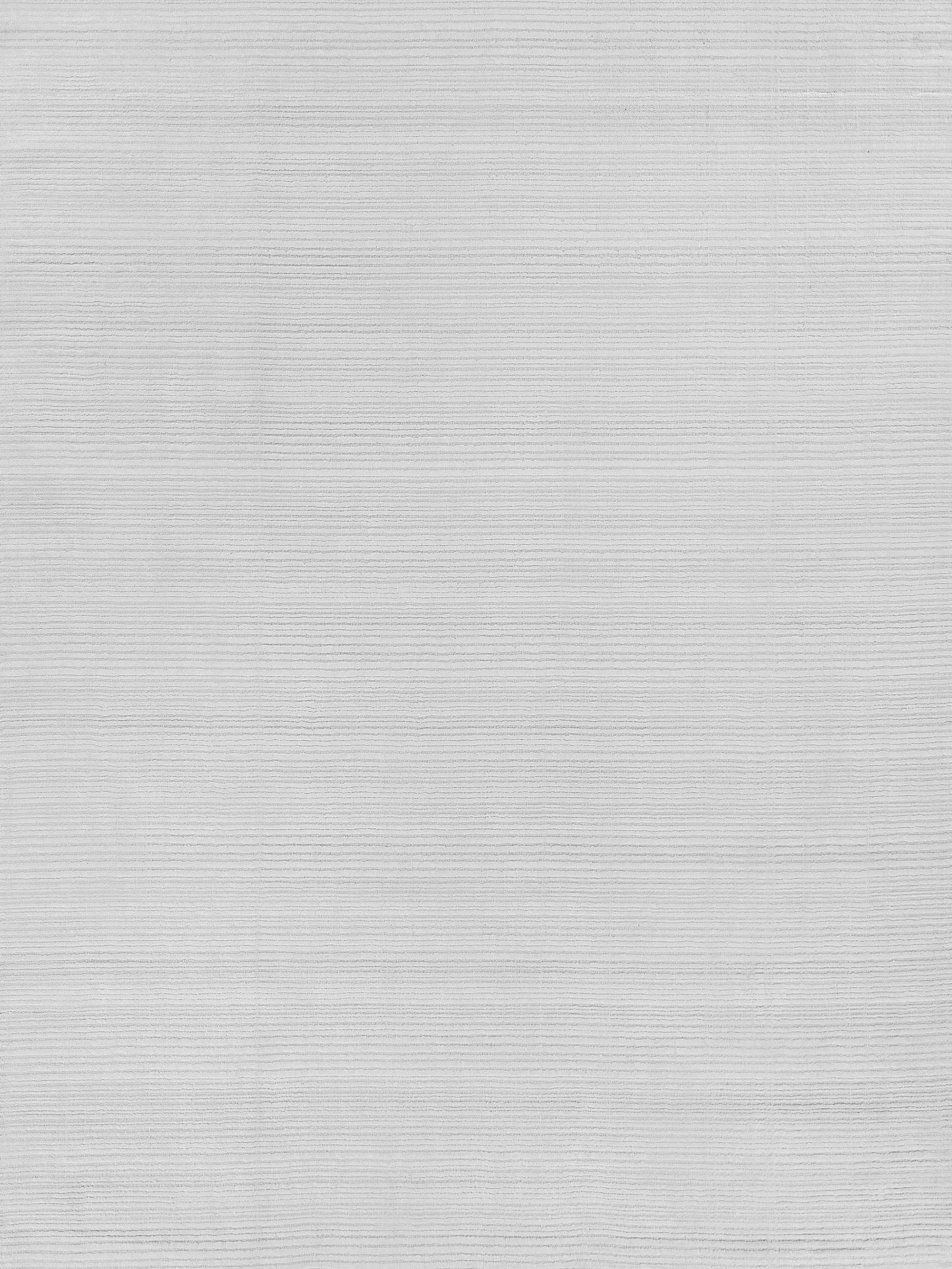 Light gray rug with a subtle horizontal stripe pattern on a neutral backdrop.