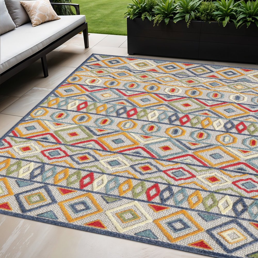 5' X 7' Ivory And Blue Southwestern Stain Resistant Indoor Outdoor Area Rug