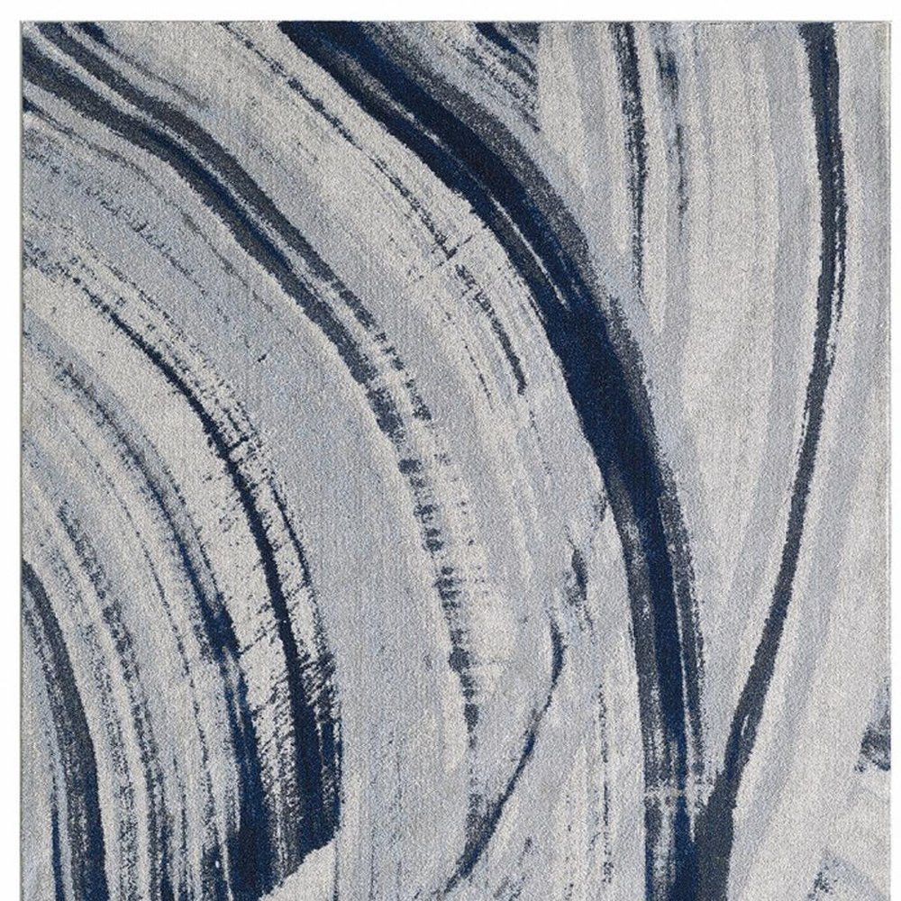 8' X 11' Ivory and Blue Abstract Area Rug