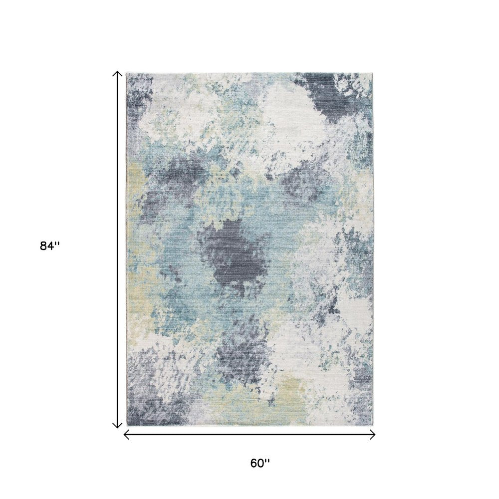 5' X 8' Blue and Ivory Abstract Area Rug