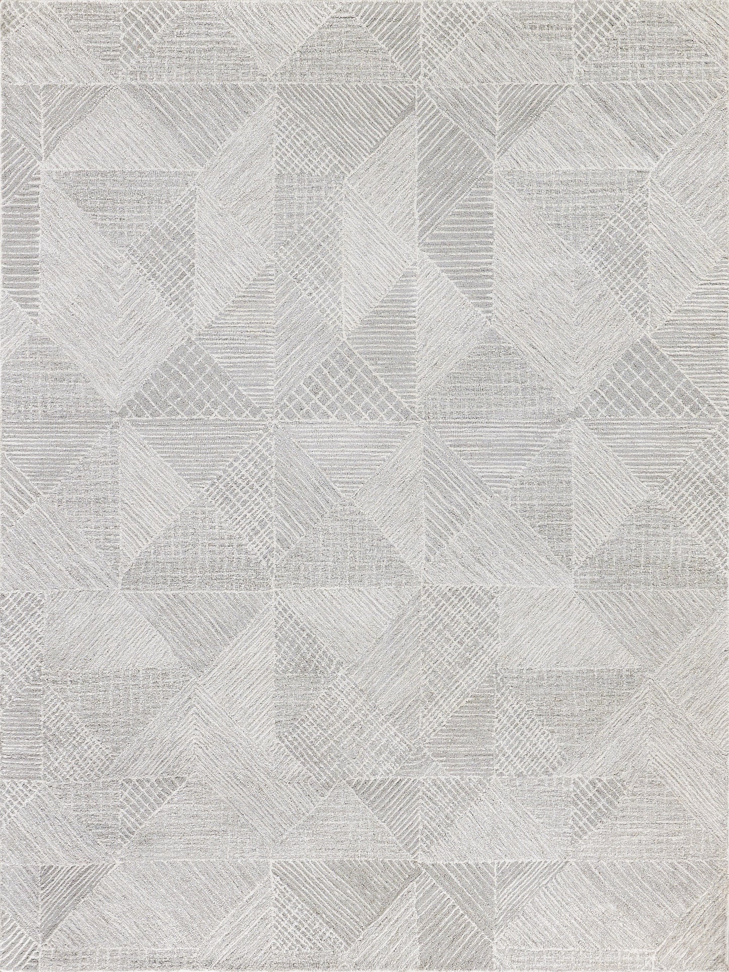Textured gray rug featuring a geometric design with alternating patterns of lines and shapes for a modern aesthetic.