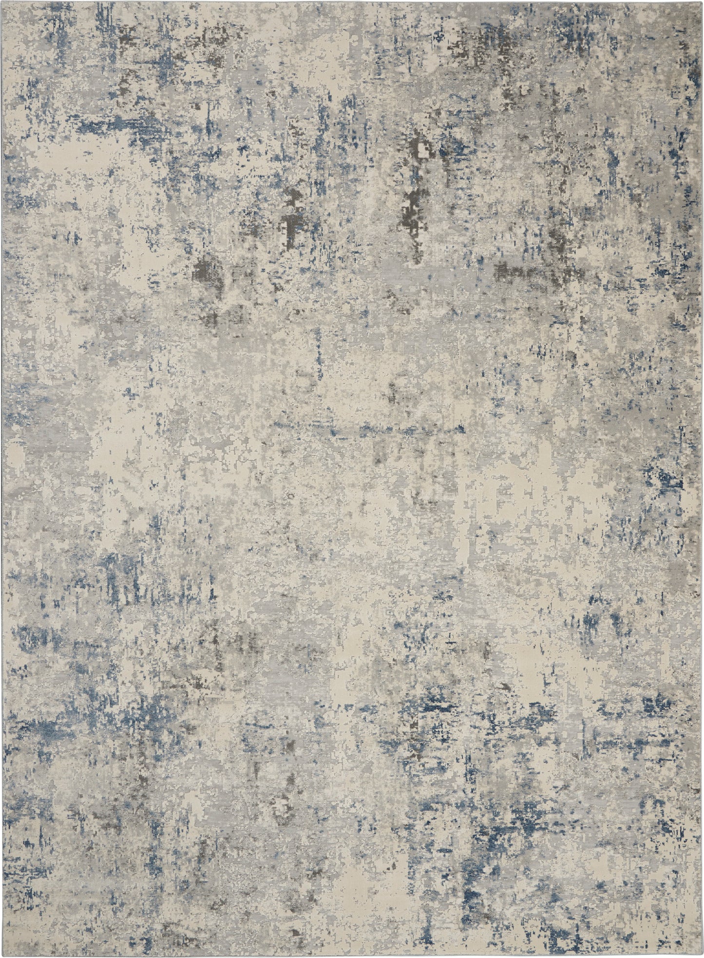 Abstract distressed area rug in blue, gray and cream tones with a weathered, mottled pattern.
