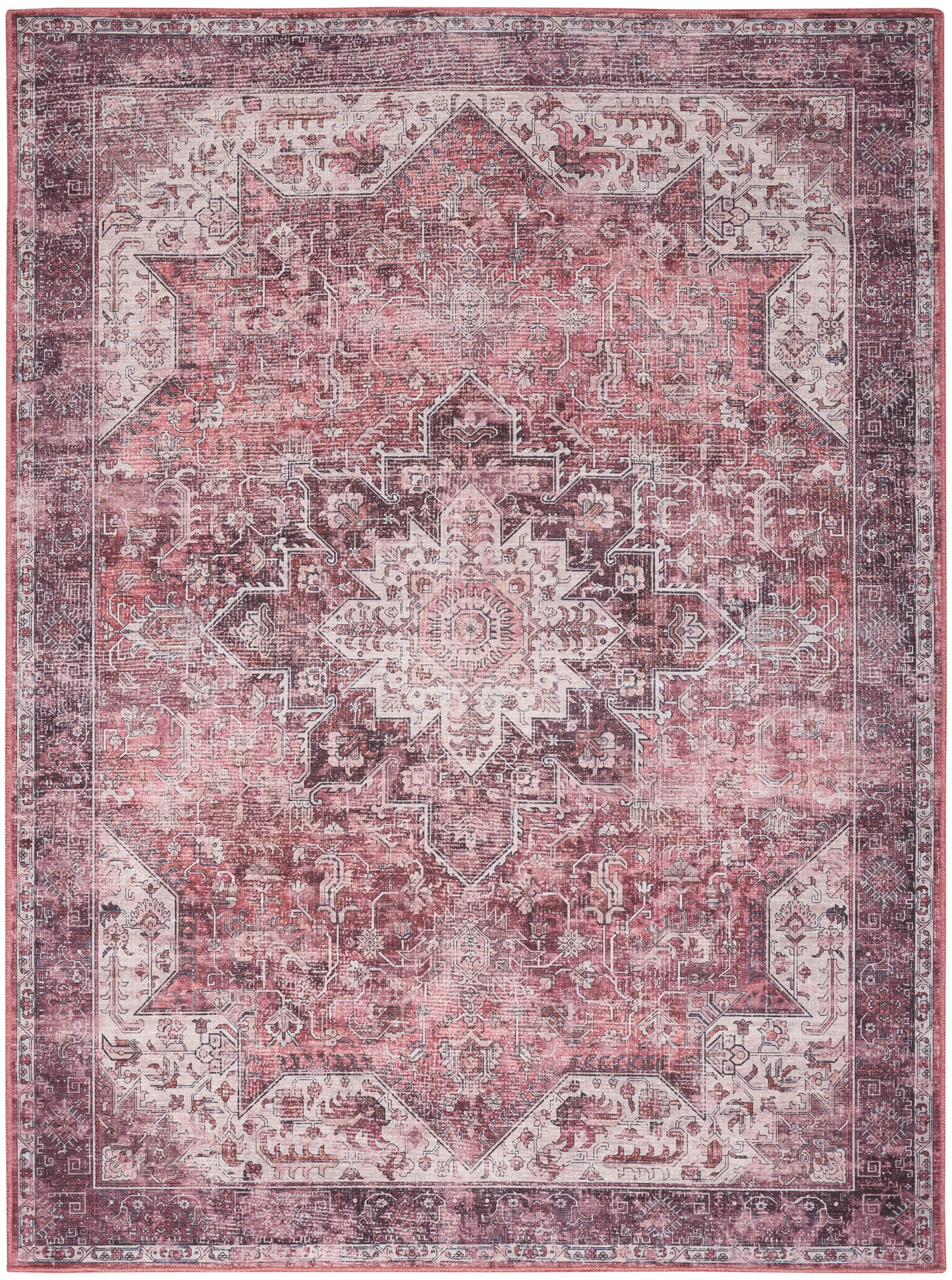 Distressed pink Persian-style area rug with ivory and burgundy central medallion, ornate borders, rectangular.