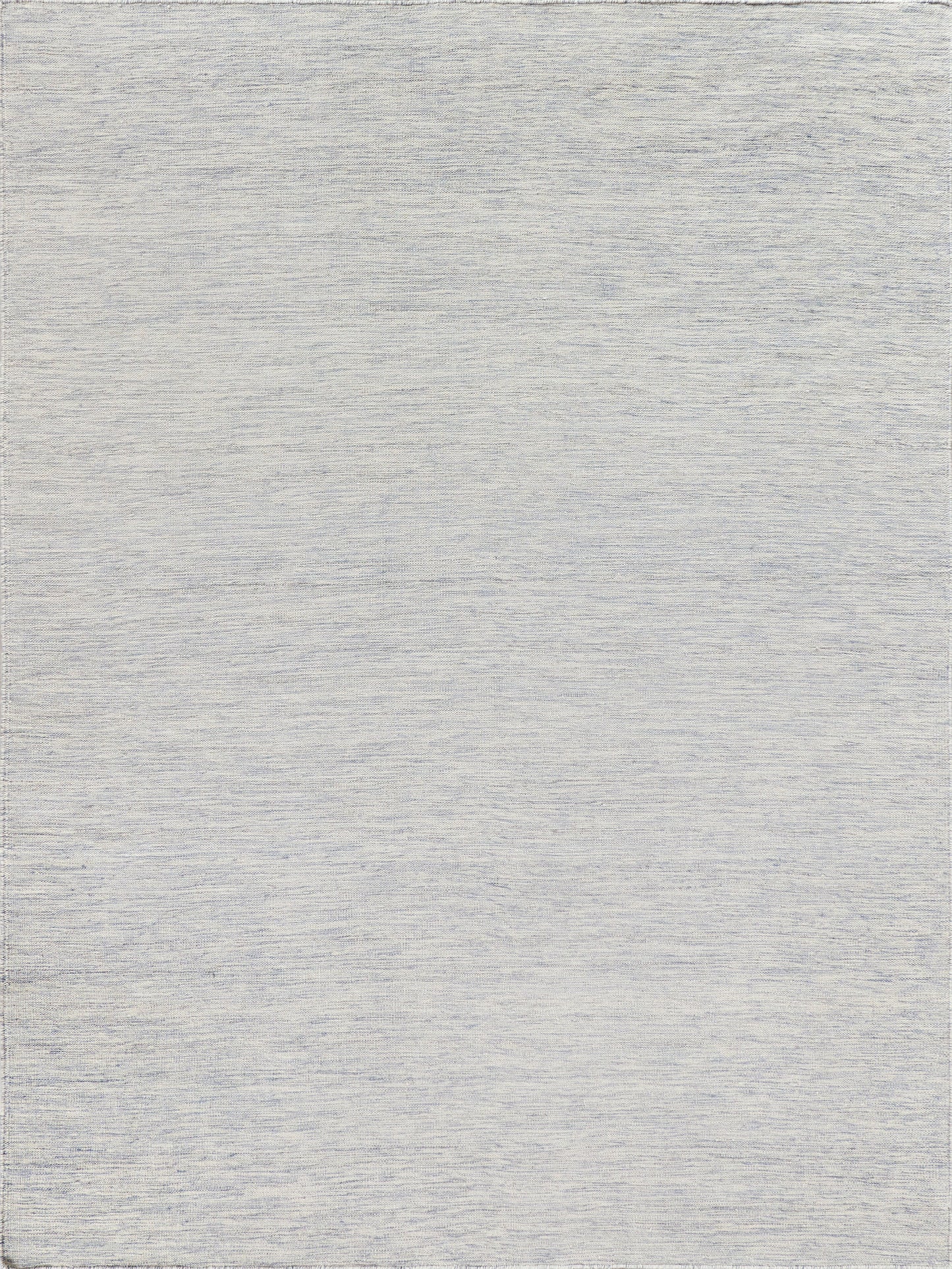 Light grey flatweave rectangular rug with a subtle textured pattern.