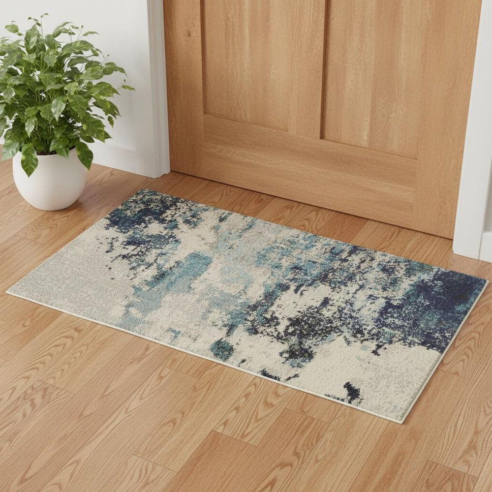3' X 5' Ivory And Teal Blue Abstract Power Loom Non Skid Area Rug