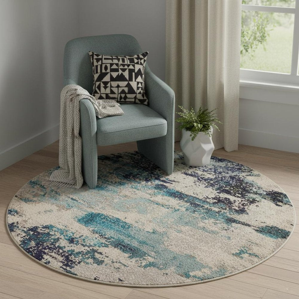 4' X 4' Ivory And Teal Blue Round Abstract Power Loom Non Skid Area Rug