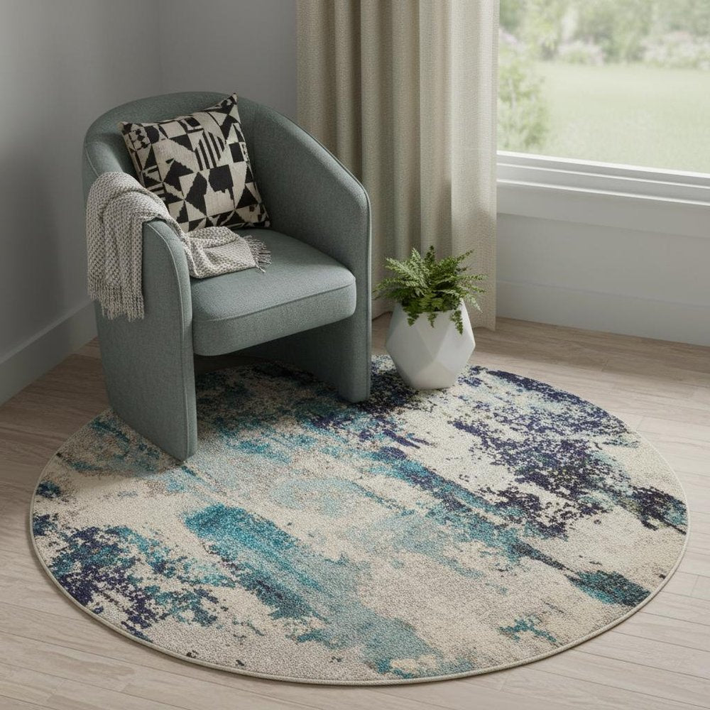 5' X 5' Ivory And Teal Blue Round Abstract Power Loom Non Skid Area Rug