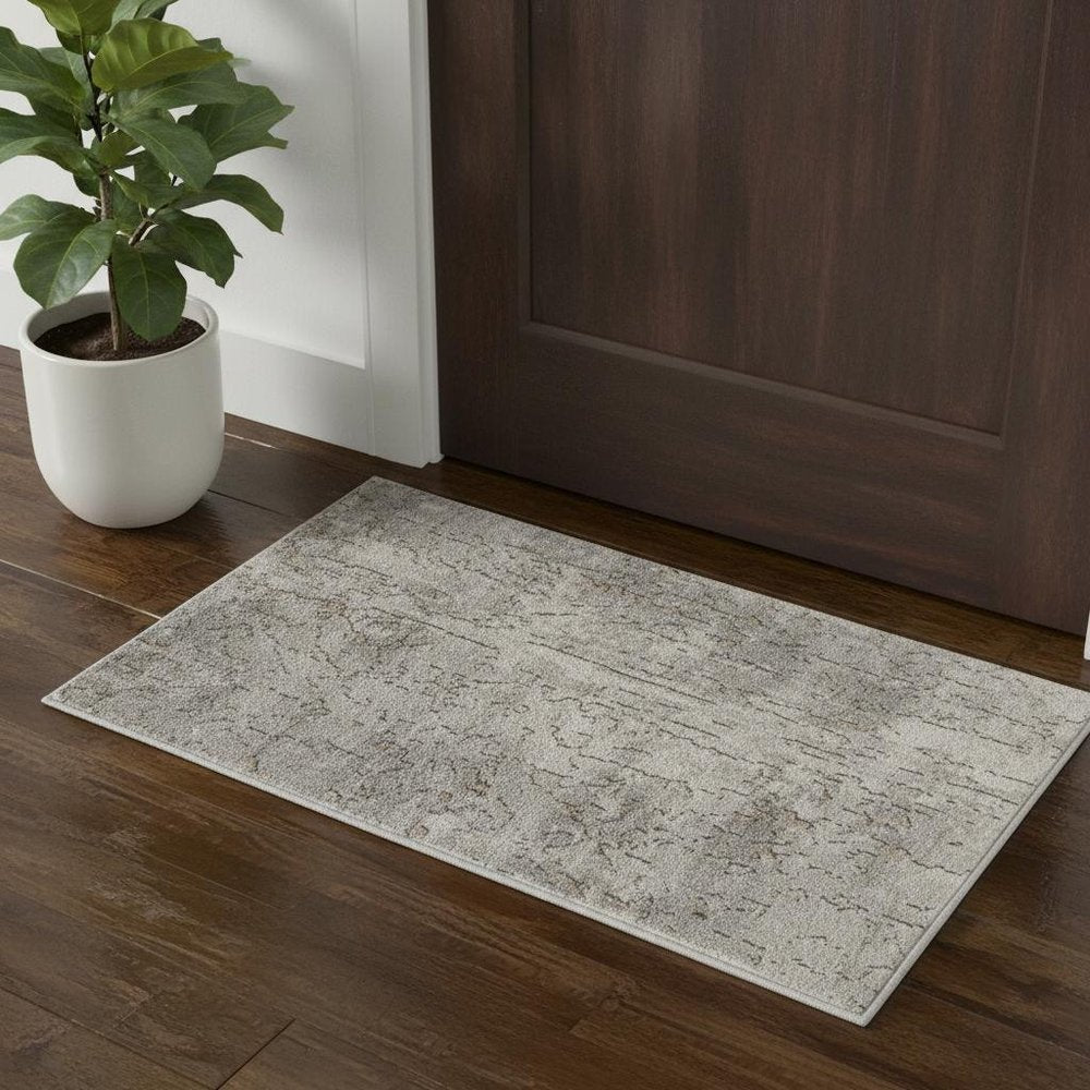 2' X 4' Beige And Grey Abstract Power Loom Non Skid Area Rug