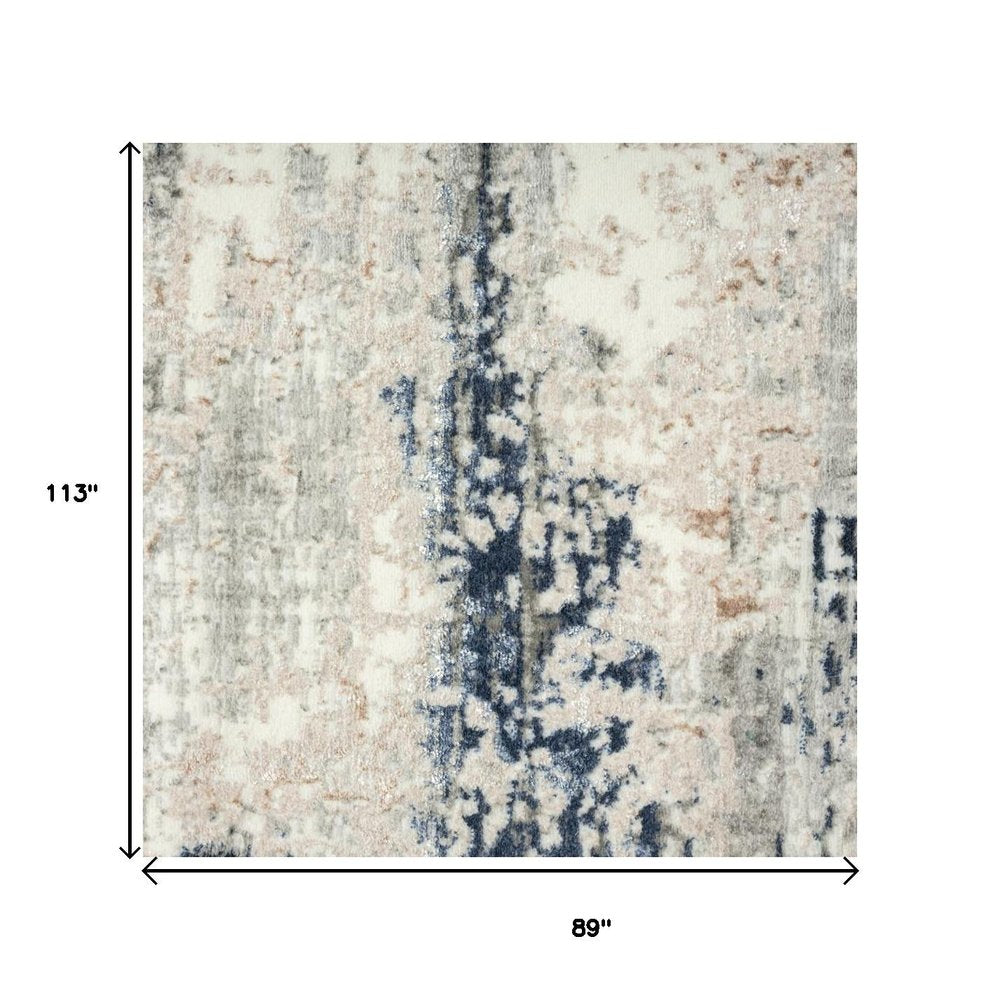 7' X 9' Beige Cream Blue And Gray Abstract Stain Resistant Area Rug