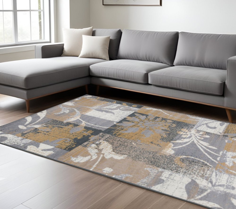 7' X 9' Beige And Black Floral Distressed Area Rug