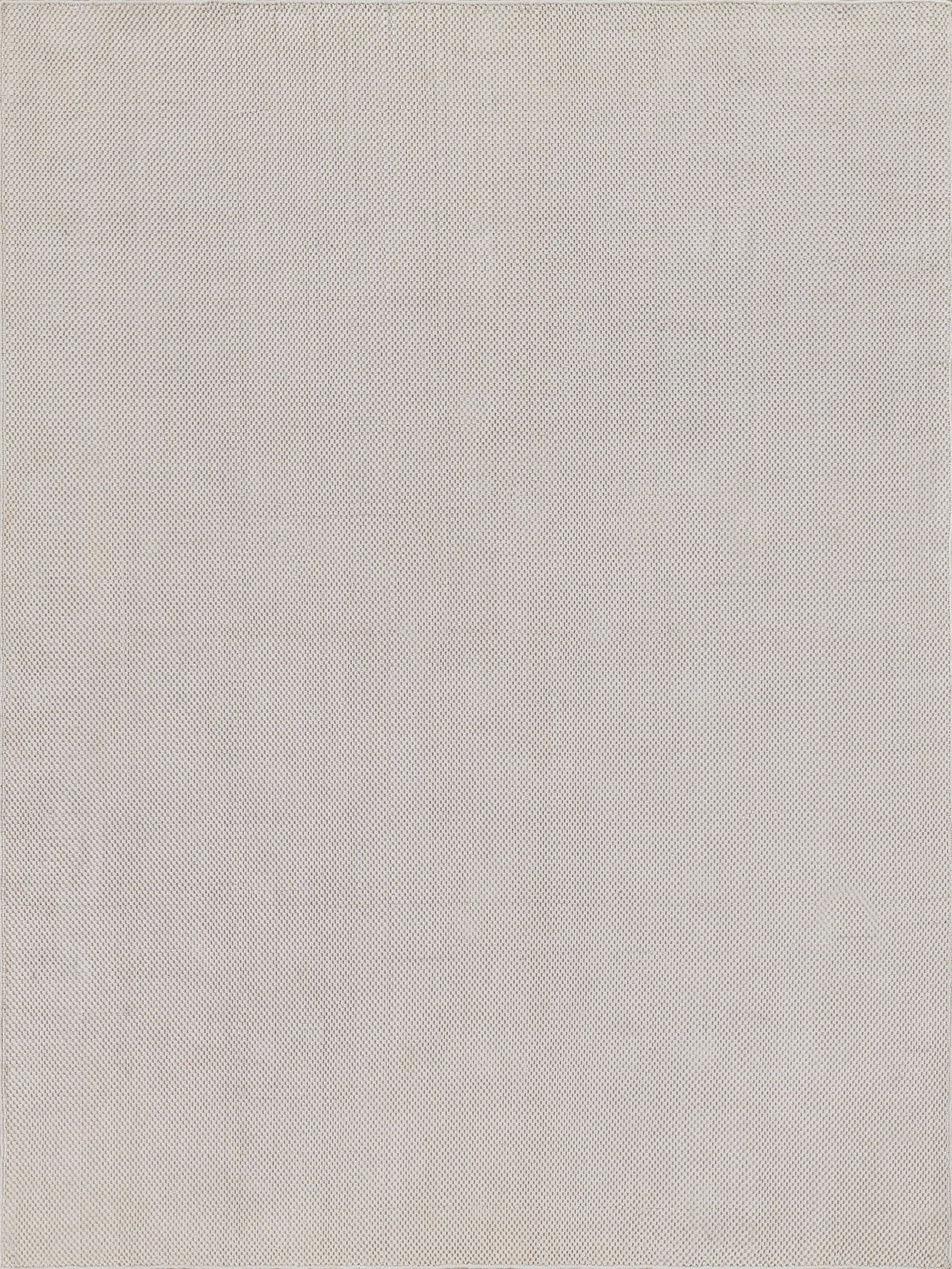 Light beige flatweave rectangular rug with a subtle textured weave in a neutral tone.