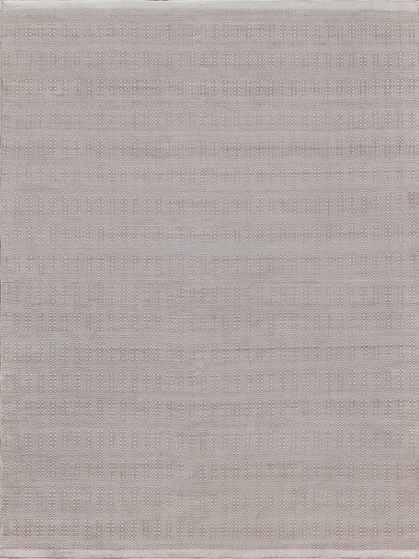 Light beige textured rug featuring a subtle geometric pattern, woven from soft, durable materials, ideal for home decor.