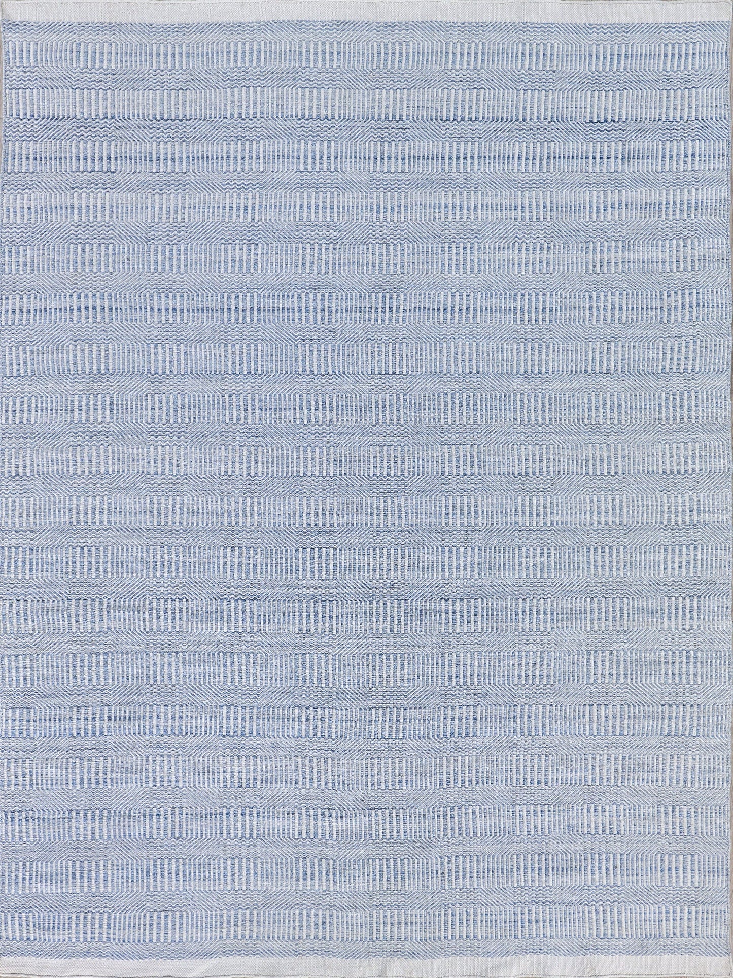 Light blue rectangular flat-weave rug with narrow horizontal stripes and small rectangular texture; indoor/outdoor.