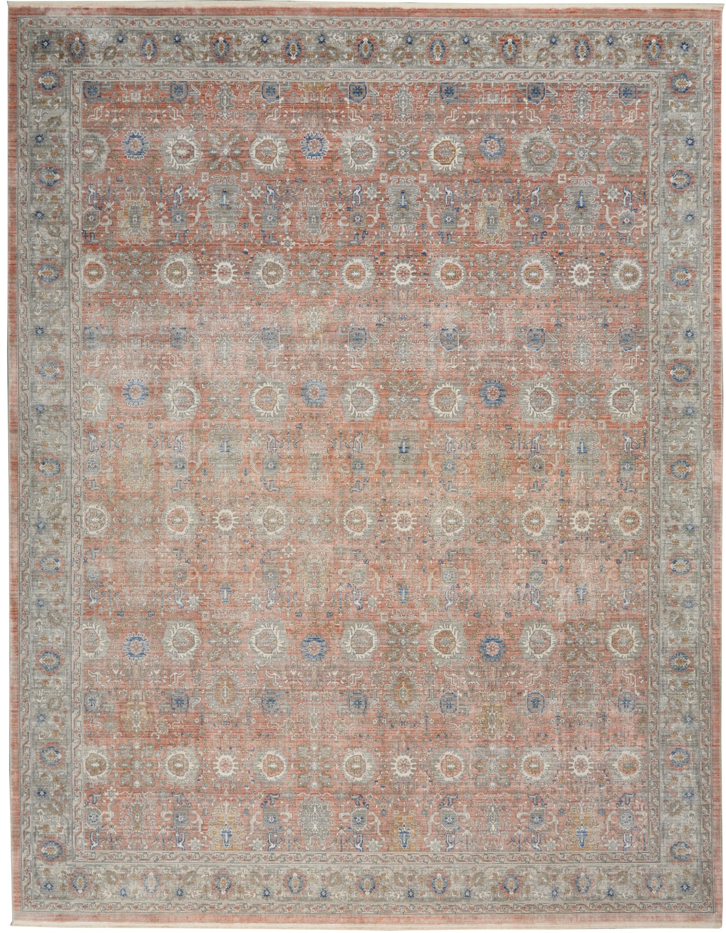 Cozy traditional oriental rug with peach field, blue and ivory floral medallions, and pale gray border.