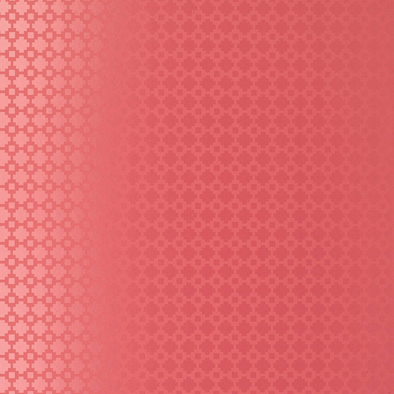 Coral-pink gradient fabric with a subtle repeating quatrefoil lattice pattern, suitable for upholstery or wallpaper.