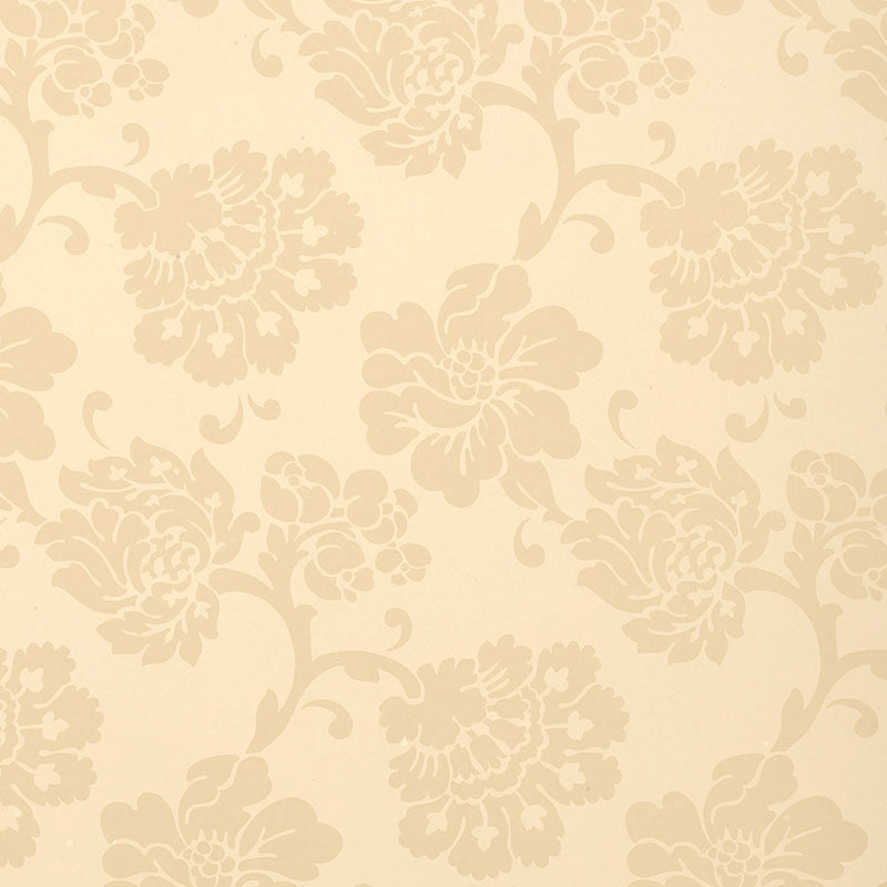 Cream backdrop with a soft beige damask floral wallpaper pattern.