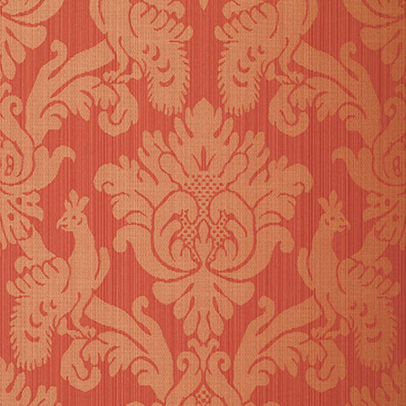 Coral red damask wallpaper with beige ornate scroll floral pattern.