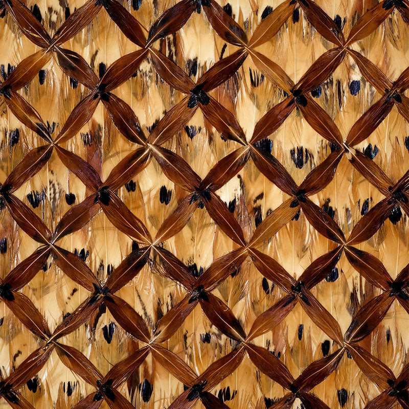 Dark brown lattice pattern on a golden tan leopard-print background, forming a diamond grid.