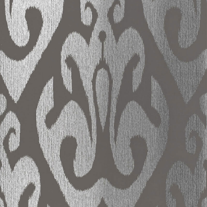 Two-tone graphite damask wallpaper with silver scroll motifs; classic ornamental pattern, textured finish.