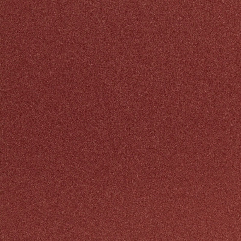 Rust-red suede-like fabric swatch with soft matte texture.