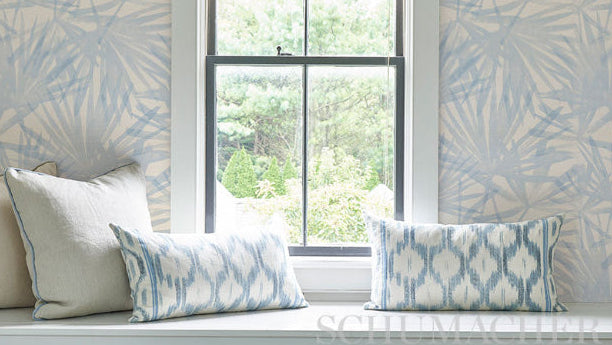 Chambray Sunlit Palm Sisal wallpaper featuring watercolor palm fronds inspired by sunlight through trees, woven sisal texture, coastal luxury wallcovering ideal for accent walls, bedrooms, and elegant interior spaces.