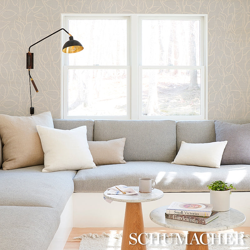 Sky blue printed grasscloth wallpaper with Solandra vine pattern.
