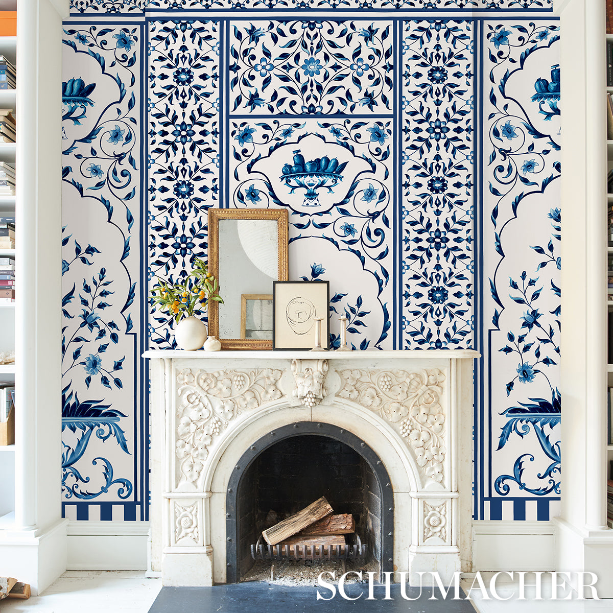 Blue decorative wall panel with an intricate white pattern on a blue background.