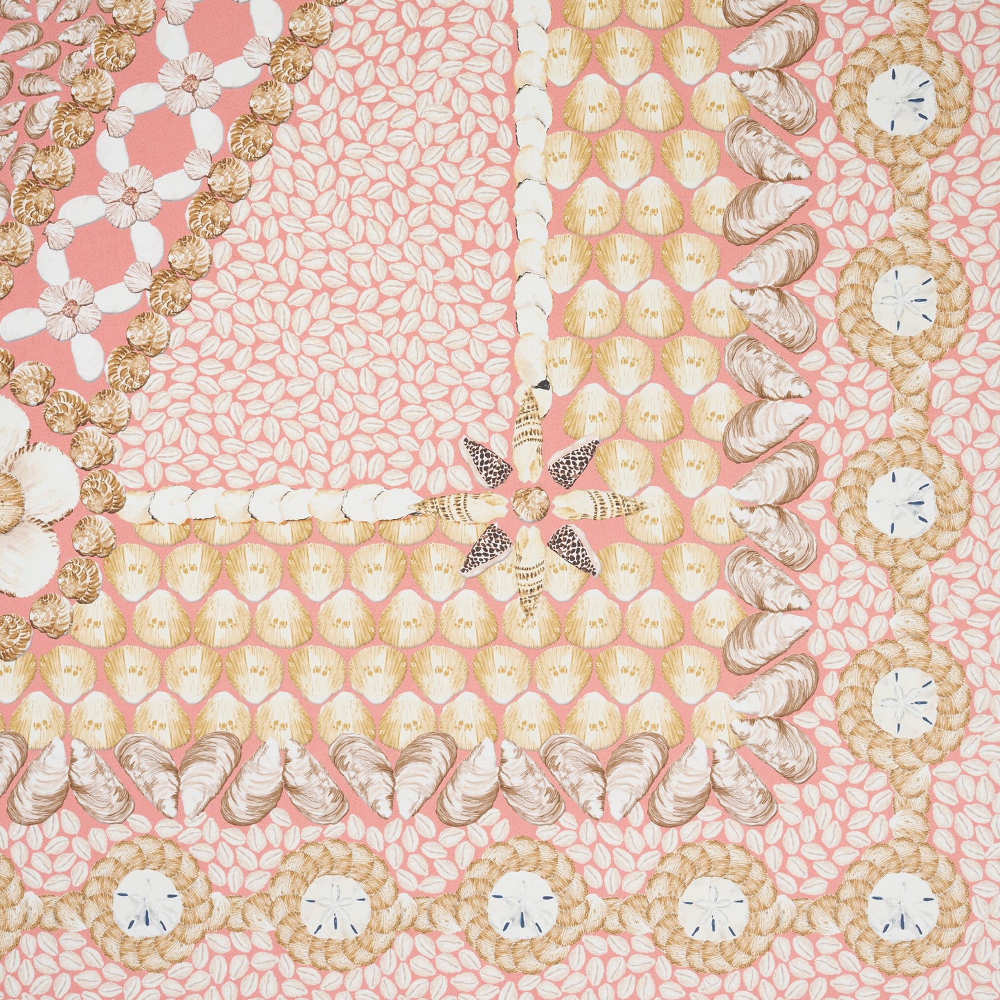 Pink fabric print with cream and gold accents, circular medallions, floral motifs and scalloped borders.