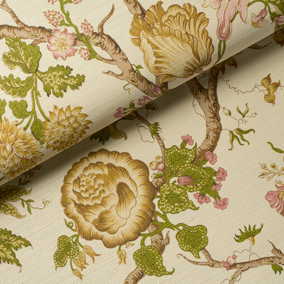 Beige botanical wallpaper with antique gold blooms, green leaves, and pink accents; rolled corner.