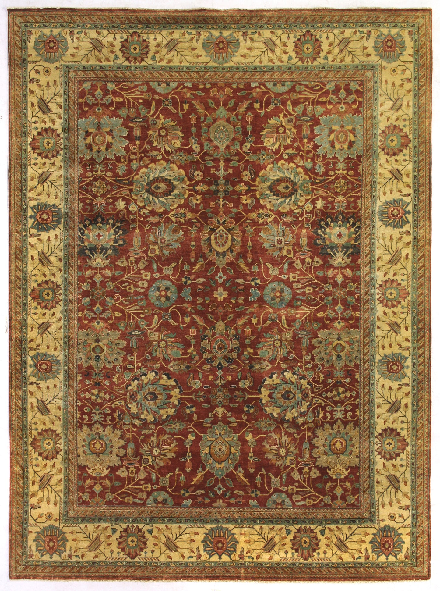 Persian-style area rug featuring a deep red field with intricate floral motifs, surrounded by a cream border with detailed designs.