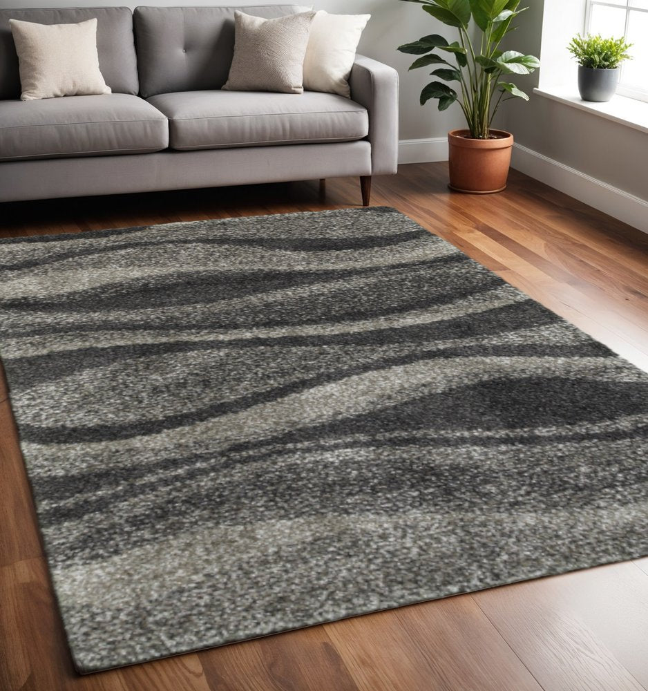 5' X 8' Charcoal Silver And Grey Abstract Shag Power Loom Stain Resistant Area Rug